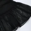 Falda de talle medio con volantes y detalles metálicos Tobago en negro