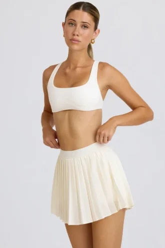 Falda de tenis plisada en blanco