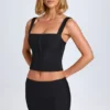Falda Issa de talle bajo y corte curvo en negro