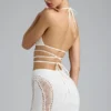 Top de bikini con tirantes cruzados y adornos Liberty en color marfil