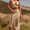 Falda larga asimétrica de talle medio con volantes Novina en estampado beige