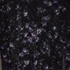 Falda larga de talle medio con adornos y abertura en el muslo Nevara en negro y morado