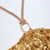 Falda larga de tirantes con detalles metálicos y adornos Abaco en dorado