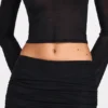Falda larga drapeada de jersey transparente de talle bajo Diana en negro