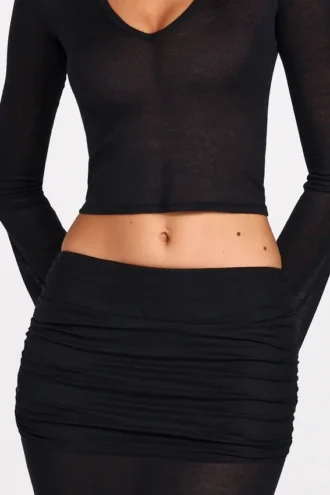 Falda larga drapeada de jersey transparente de talle bajo Diana en negro