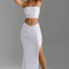 Falda larga Pelagia con cintura en V y abertura en el muslo, adornada, en color blanco