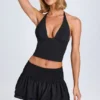 Falda micro con fruncidos y volantes Nellary en negro