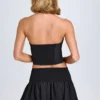 Falda micro con fruncidos y volantes Nellary en negro