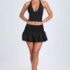 Falda micro con fruncidos y volantes Nellary en negro