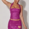 Falda micro de corte A con detalle de corazón adornado de Querida en color magenta