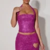 Falda micro de corte A con detalle de corazón adornado de Querida en color magenta