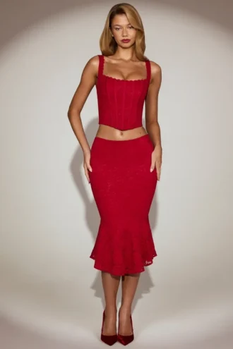 Falda midi acampanada de encaje coral en rojo intenso