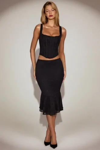 Falda midi acampanada de encaje Fjolla en negro