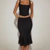 Falda midi acampanada de encaje Fjolla en negro