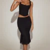 Falda midi acampanada de encaje Fjolla en negro