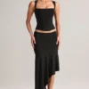 Falda midi asimétrica de talle bajo Niva Modal en negro