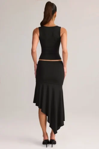 Falda midi asimétrica de talle bajo Niva Modal en negro