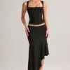 Falda midi asimétrica de talle bajo Niva Modal en negro