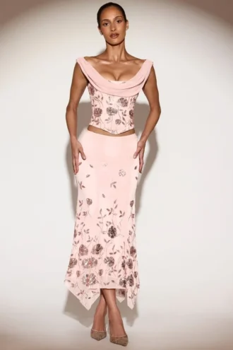 Falda midi Winika con adornos, tiro medio y bajo en forma de pañuelo en rosa