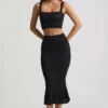 Falda midi Yasira con volantes y tejido de punto calado en negro