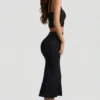 Falda midi Yasira con volantes y tejido de punto calado en negro