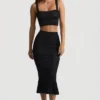 Falda midi Yasira con volantes y tejido de punto calado en negro