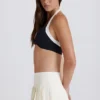 Falda-pantalón de tenis plisada de talle bajo y tejido suave en color marfil