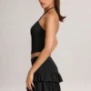 Falda-pantalón mini de modal con volantes y talle medio Azaria en negro