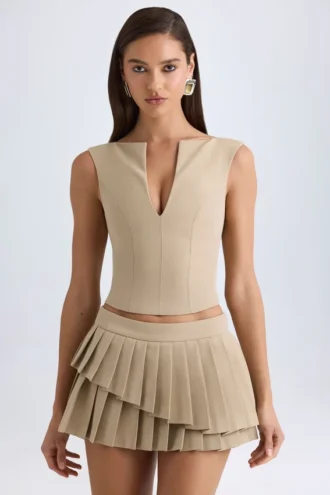 Falda plisada de corte bajo con capas de Nada en color camel