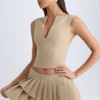 Falda plisada de corte bajo con capas de Nada en color camel