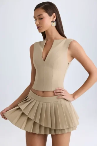 Falda plisada de corte bajo con capas de Nada en color camel