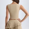 Falda plisada de corte bajo con capas de Nada en color camel