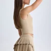 Falda plisada de corte bajo con capas de Nada en color camel