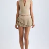 Falda plisada de corte bajo con capas de Nada en color camel
