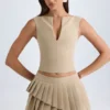 Falda plisada de corte bajo con capas de Nada en color camel