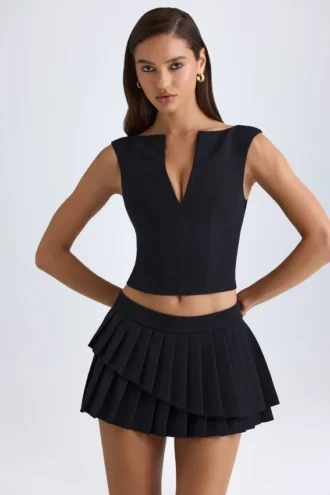 Falda plisada de corte bajo con capas Nada en negro