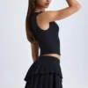 Falda plisada de corte bajo con capas Nada en negro