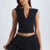 Falda plisada de corte bajo con capas Nada en negro