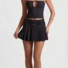 Falda plisada de talle bajo con cinturón Velora en negro