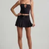 Falda plisada de talle bajo con cinturón Velora en negro