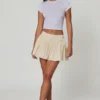 Falda Thia con detalle de lazo y bordado inglés en color marfil