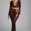 Falda vestido Zahra de jersey metalizado de talle medio en bronce cobrizo