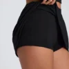 Faldapantalón mini de corte A Solene en modal negro