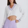 Jersey corto de punto trenzado de algodón en lila y marfil