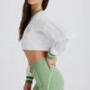 Jersey corto de punto trenzado de algodón en verde marfil