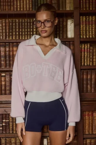 Jersey oversize de cuello en V de jersey de algodón en rosa empolvado