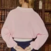 Jersey oversize de cuello en V de jersey de algodón en rosa empolvado