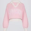 Jersey oversize de cuello en V de jersey de algodón en rosa empolvado