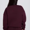 Jersey oversize de cuello redondo en color burdeos