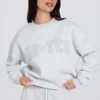 Jersey oversize de cuello redondo en gris jaspeado